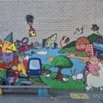 Graffiti wall bij IKC Dom Helder Camara: een blijvende handtekening van groep 8